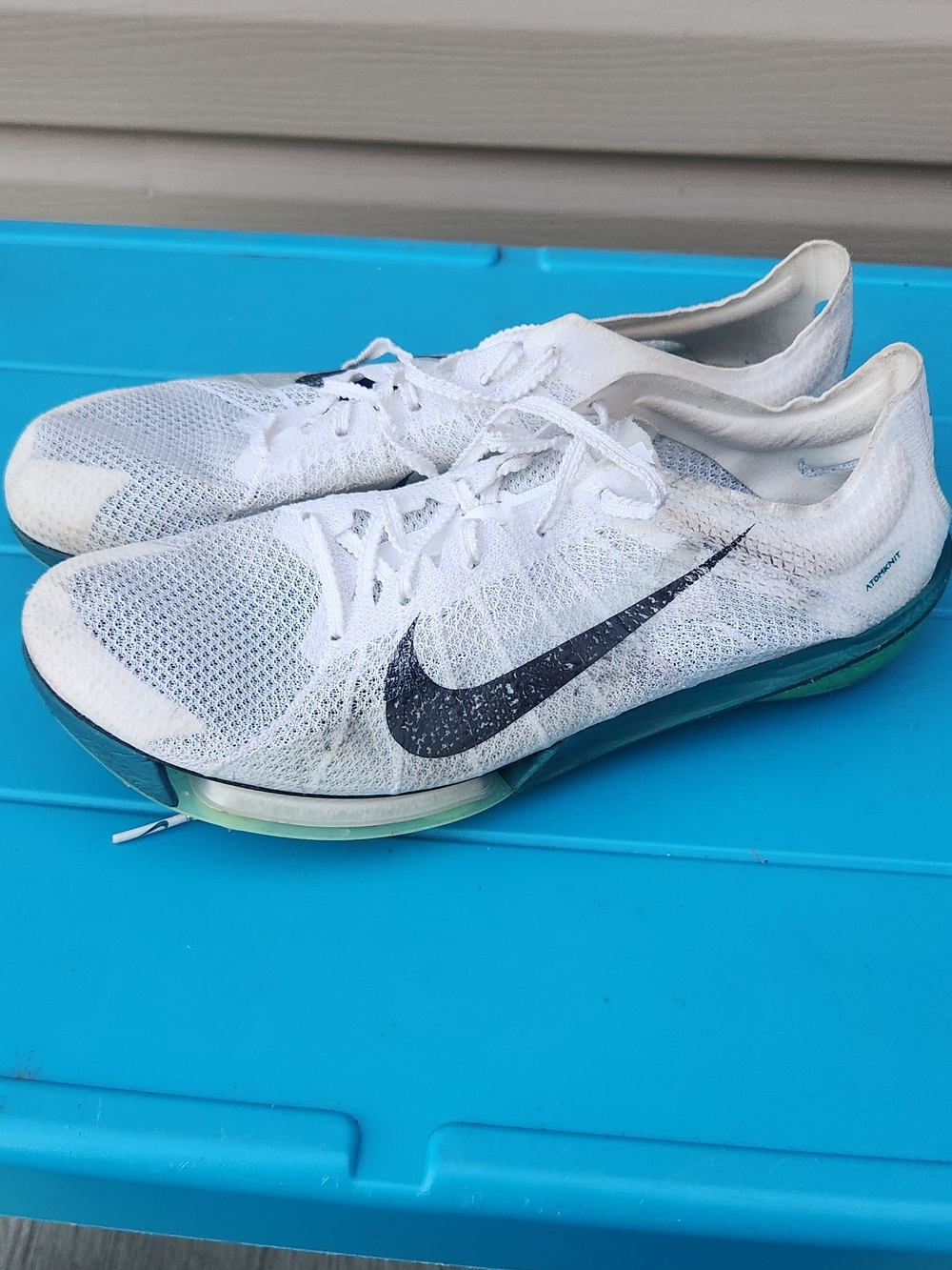 Nike Men’s White Track And Field Shoes with Black Swoosh and Green Sole W Spikes